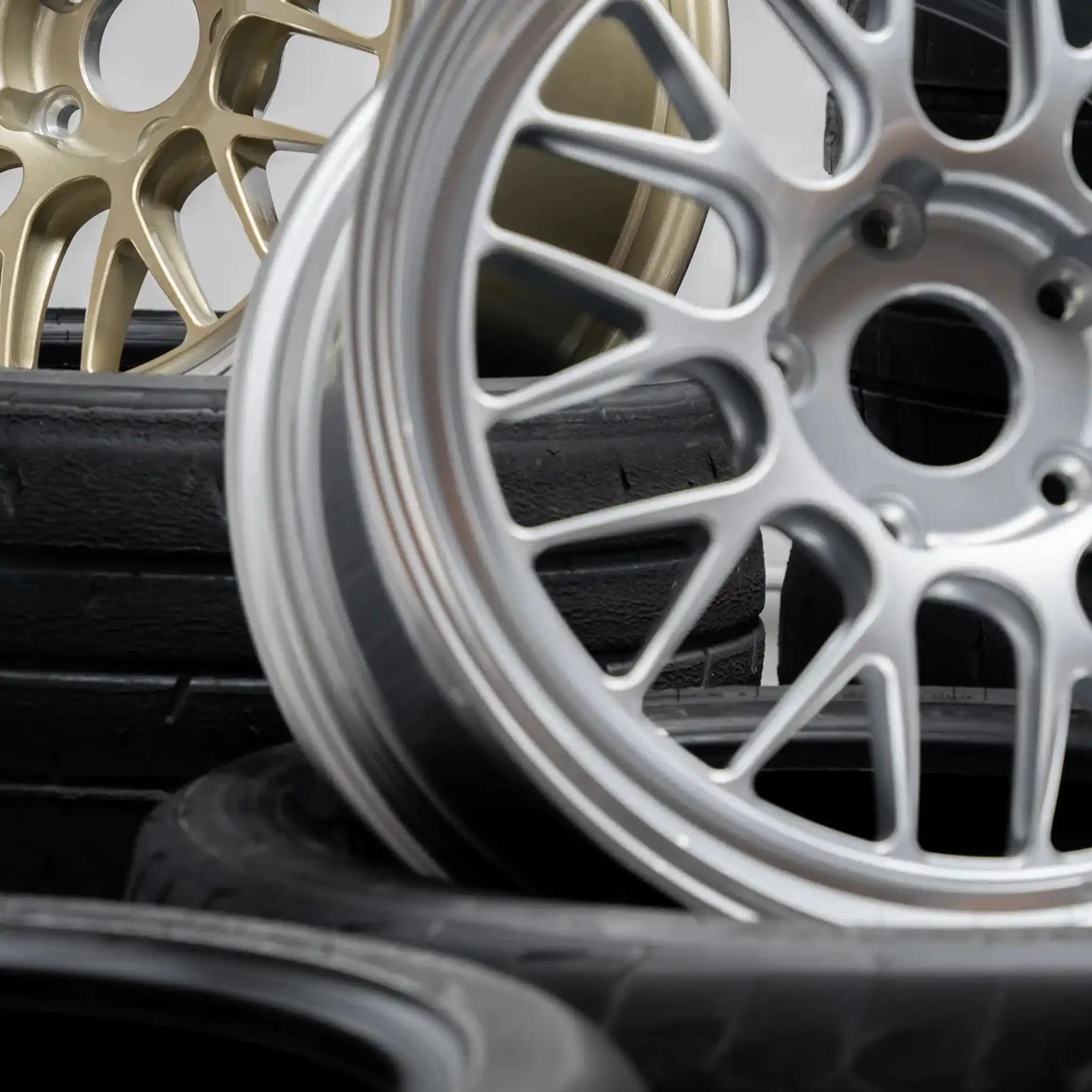 Close up Photo of Apex ML-10RT Forged Touring Line wheels in gold and silver