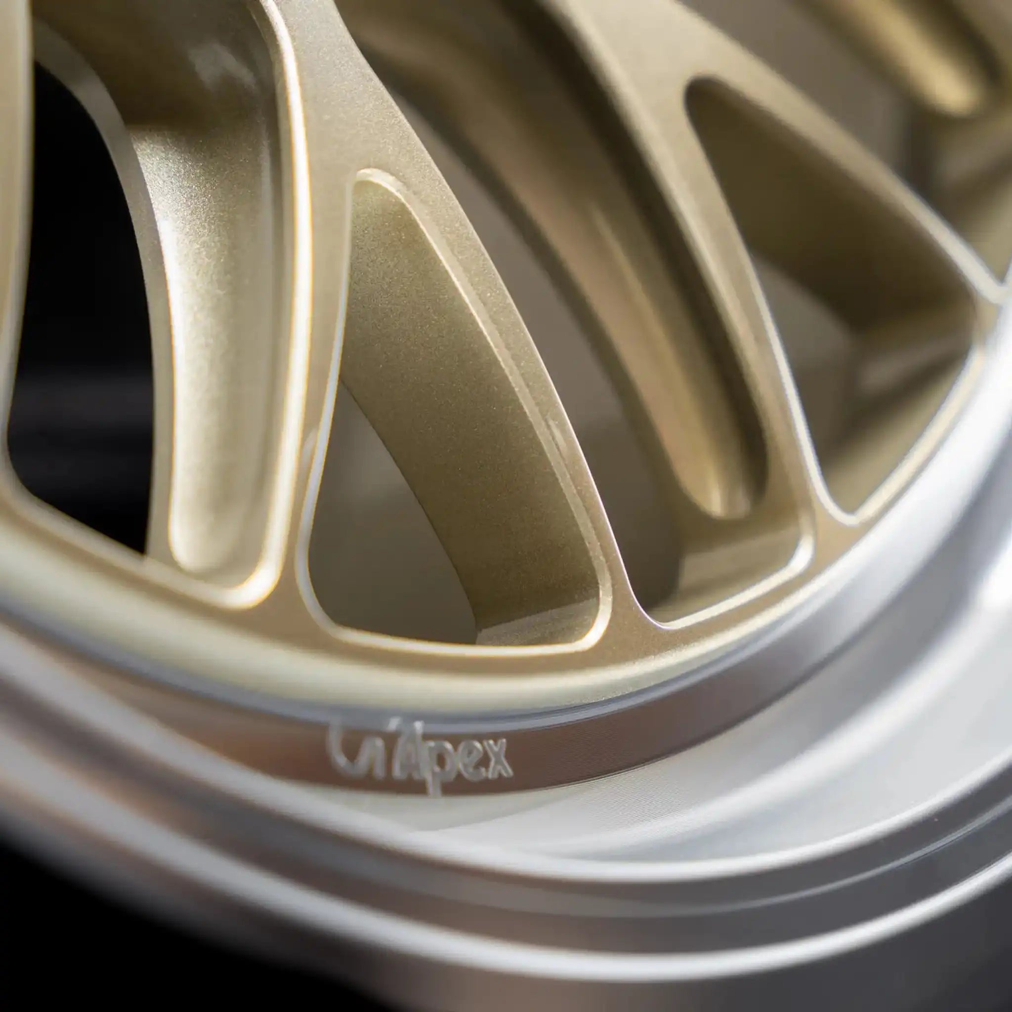 Close up Photo of gold Apex ML-10RT Forged Touring Line wheel Side-Milled Spokes and Machined Outer Lip